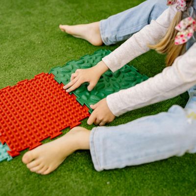 Light shining through a window onto a mat